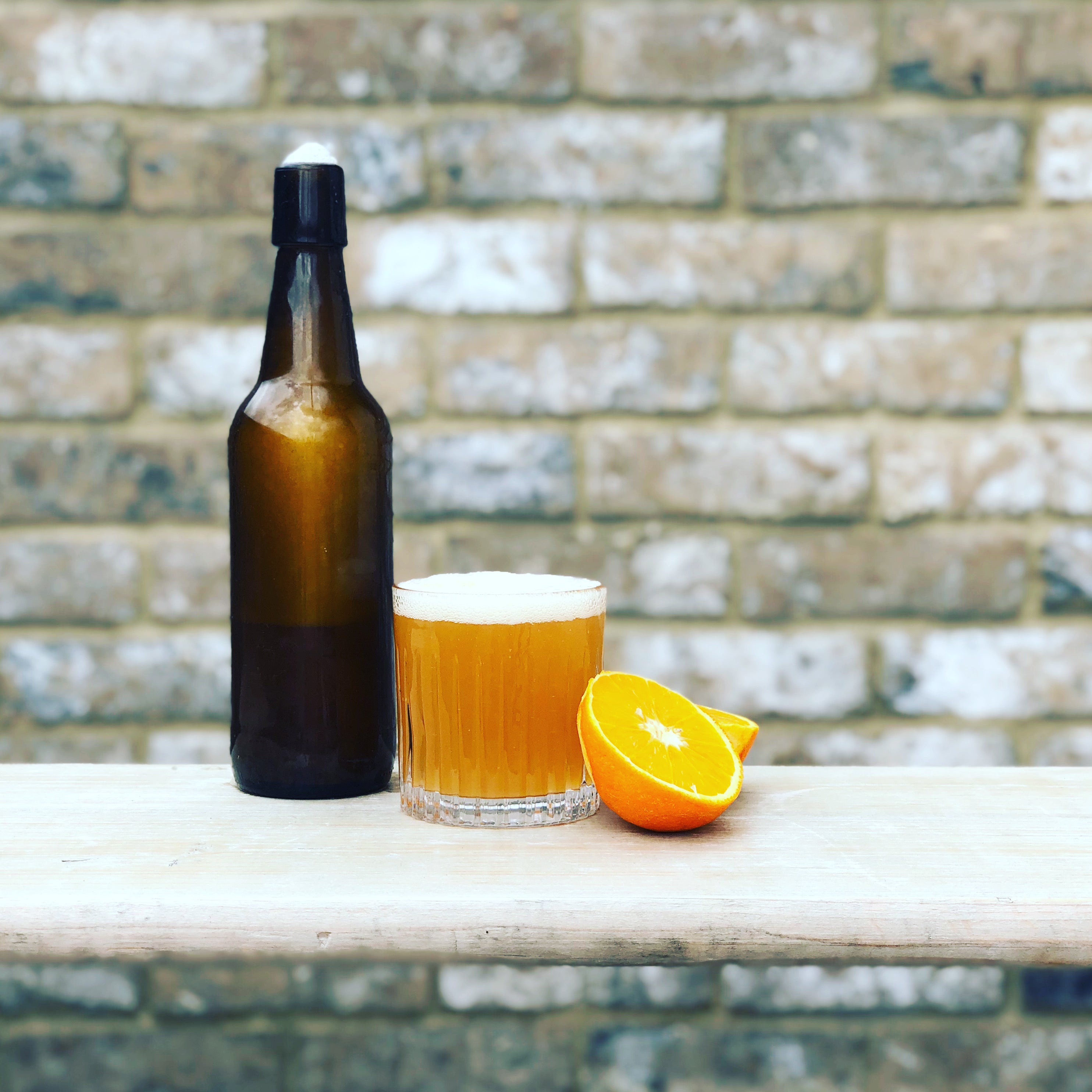 A glass of Bottle Topped Fresh Squeeze IPA made with our homebrew ingredient kit.
